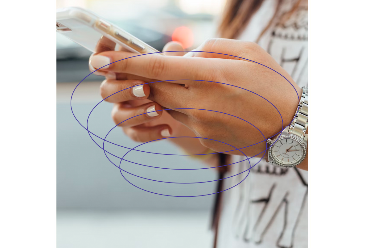 An image showing a women using her smartphone.